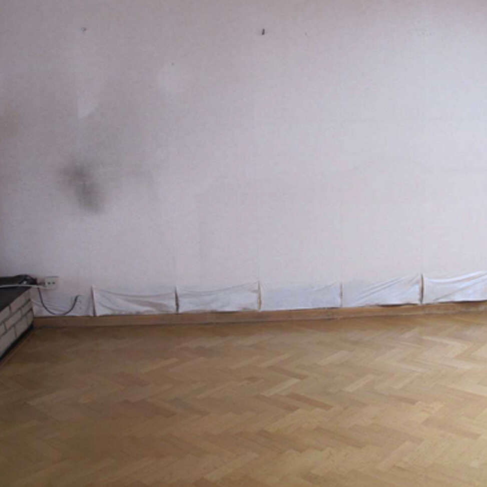 Doorslaand vocht op binnenmuur